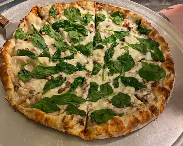 Arkansas River Pizza Company exterior view showcasing professional restaurants services in Pottsville, Arkansas