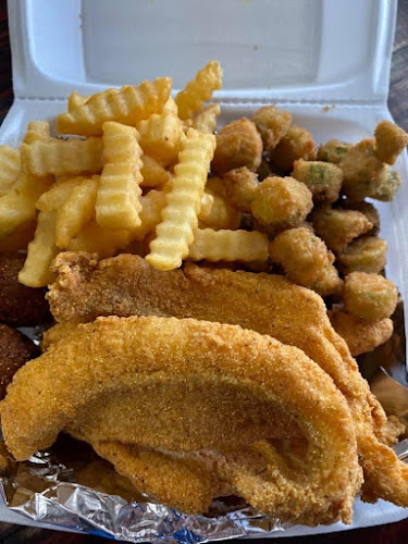 Blue shark exterior view showcasing professional restaurants services in West Helena, Arkansas