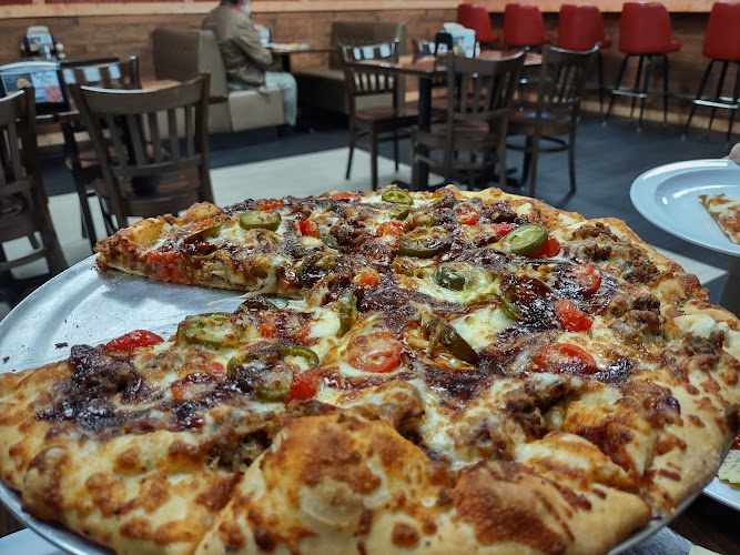 Dog Town Pizza exterior view showcasing professional restaurants services in North Little Rock, Arkansas