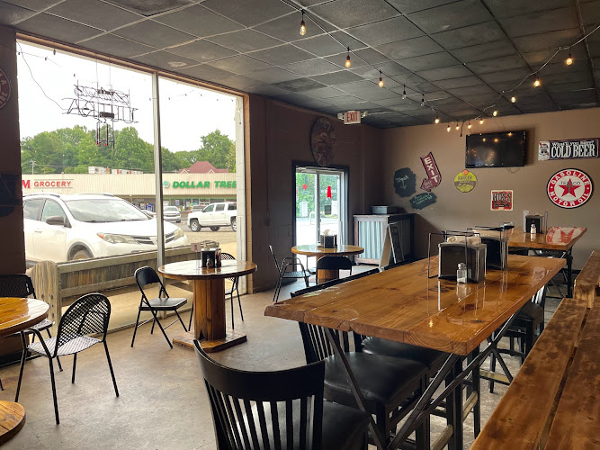 DownTown 56 Pizza and Grill exterior view showcasing professional restaurants services in Roanoke, Alabama