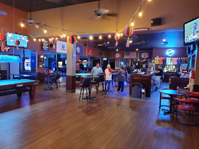 Hat Trick Sports Bar and Grille exterior view showcasing professional restaurants services in Montgomery, Alabama