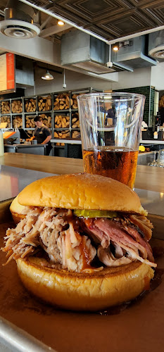 Jim 'N Nick's Bar-B-Q exterior view showcasing professional restaurants services in Oxford, Alabama