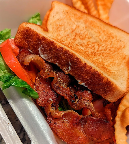 John E Hall & Son exterior view showcasing professional restaurants services in Cecil, Alabama