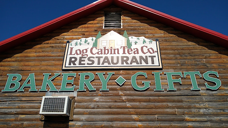 Log Cabin Restaurant & Tea Co. exterior view showcasing professional restaurants services in Falkville, Alabama