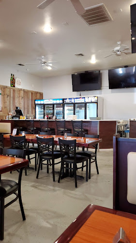 Megatoppers Pizza Joint exterior view showcasing professional restaurants services in Bullhead City, Arizona