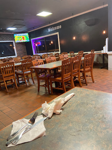 None exterior view showcasing professional restaurants services in Piedmont, Alabama