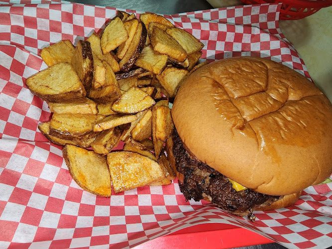 Oasis Bar & Grill exterior view showcasing professional restaurants services in Cottondale, Alabama