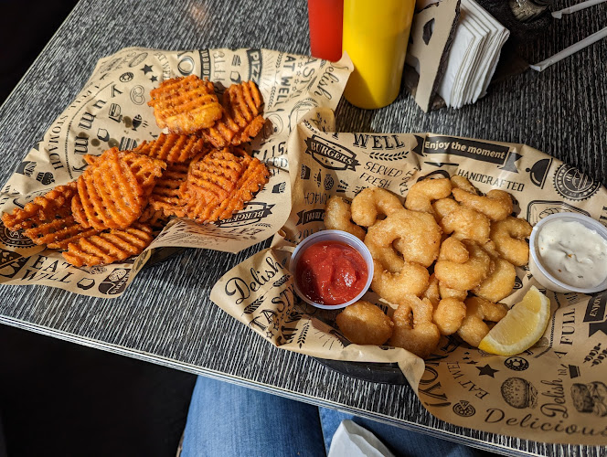 Powder house exterior view showcasing professional restaurants services in Cordova, Alaska