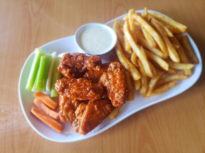 Range 42 Bar & Grill exterior view showcasing professional restaurants services in Montgomery, Alabama