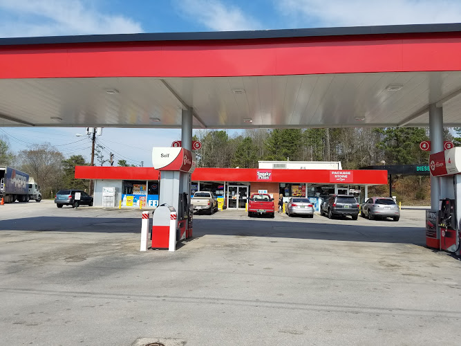 Sneaky Pete's Hotdogs/ BP gas station/Liquor store exterior view showcasing professional restaurants services in Mc Calla, Alabama
