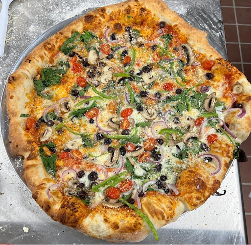 Sylvia's Pizzeria exterior view showcasing professional restaurants services in Pine Bluff, Arkansas