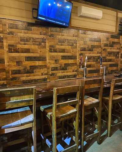 The Market at John Hall Store exterior view showcasing professional restaurants services in Cecil, Alabama